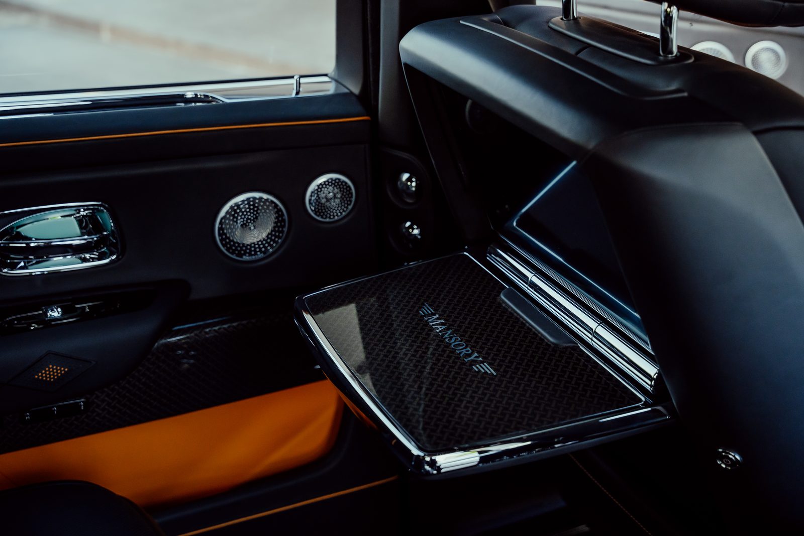 Carbon-fibre Mansory picnic table in a Rolls-Royce Cullinan